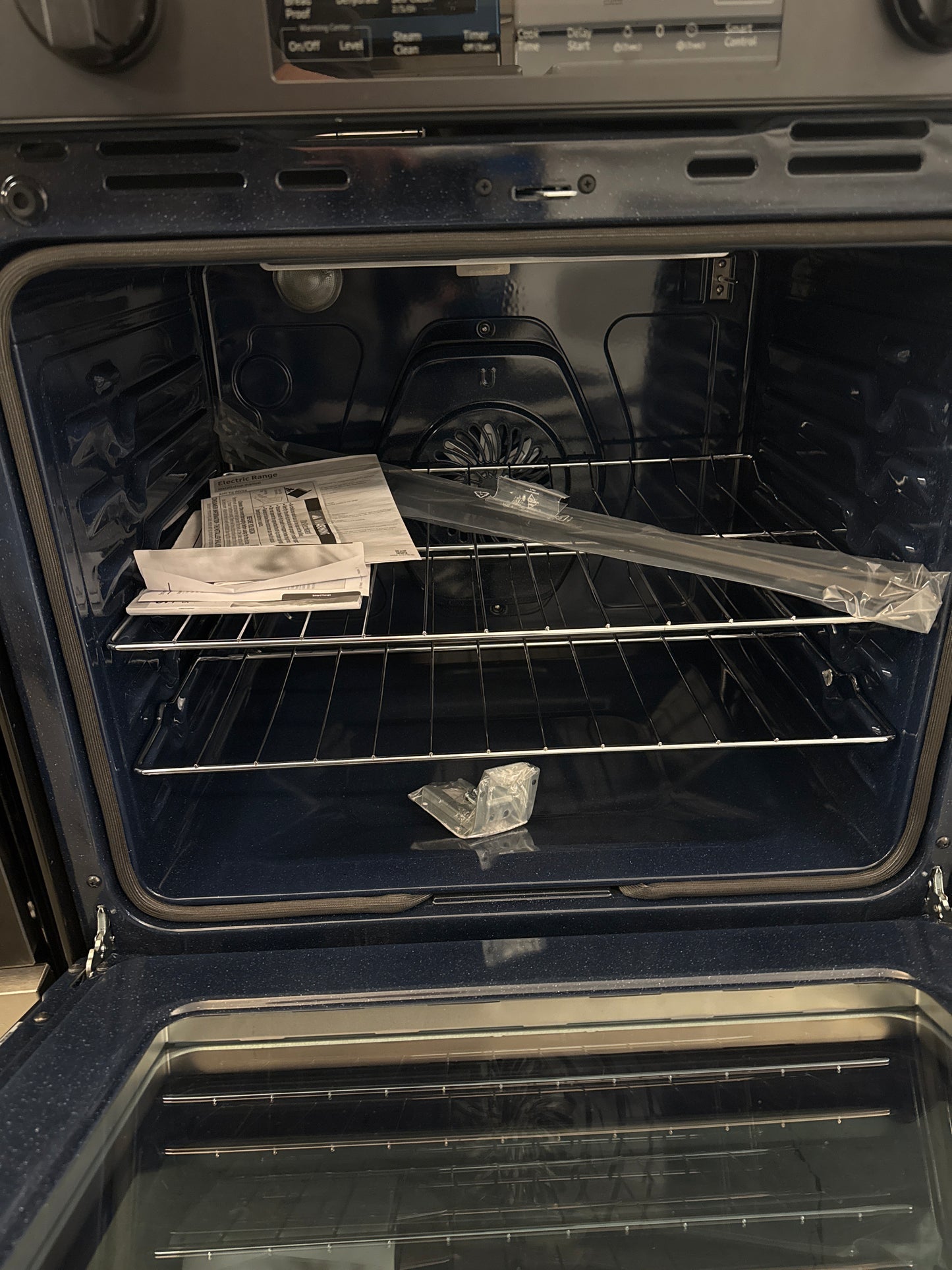 Cuisinière électrique encastrable à 5 éléments avec convection par ventilateur 6,3 pi³ 30 po de Samsung (NSE6DG8300SRAC) - Acier inoxydable