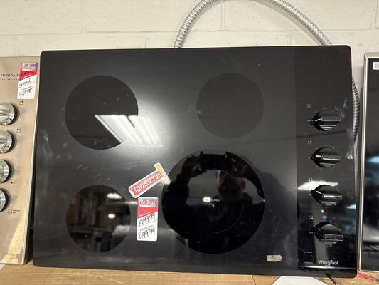 Whirlpool Table de cuisson électrique de 30 pouces en vitrocéramique avec 4 brûleurs et un élément radiant double en noir WCE55US0HB