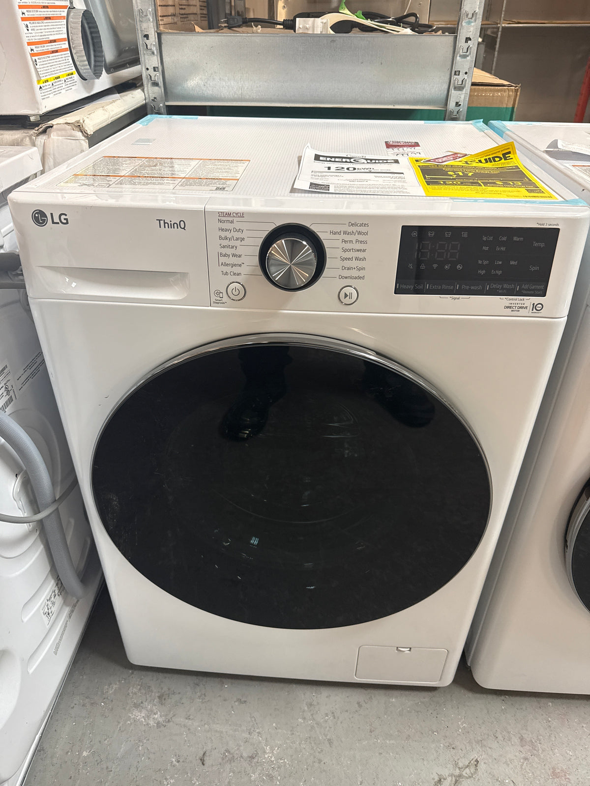 Laveuse vapeur 2,6 pi³ compacte HE à chargement frontal avec capteur IA de LG - Energy Star (WM1455HWA) - Blanc