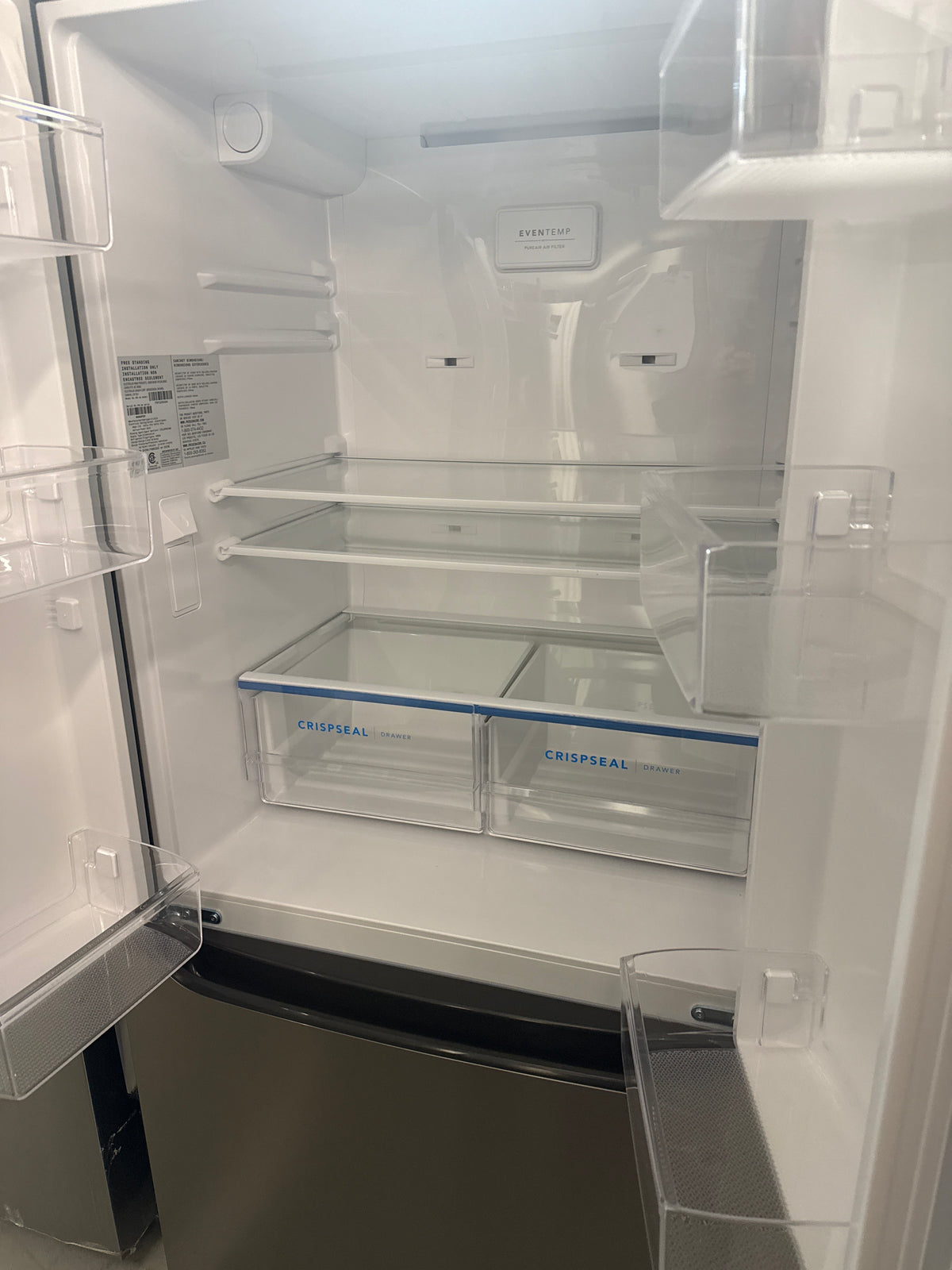 Réfrigérateur à deux portes de 19,6 pi³ de 33 po à distributeur d'eau de Frigidaire (FRFG2033AV) - Acier inoxydable