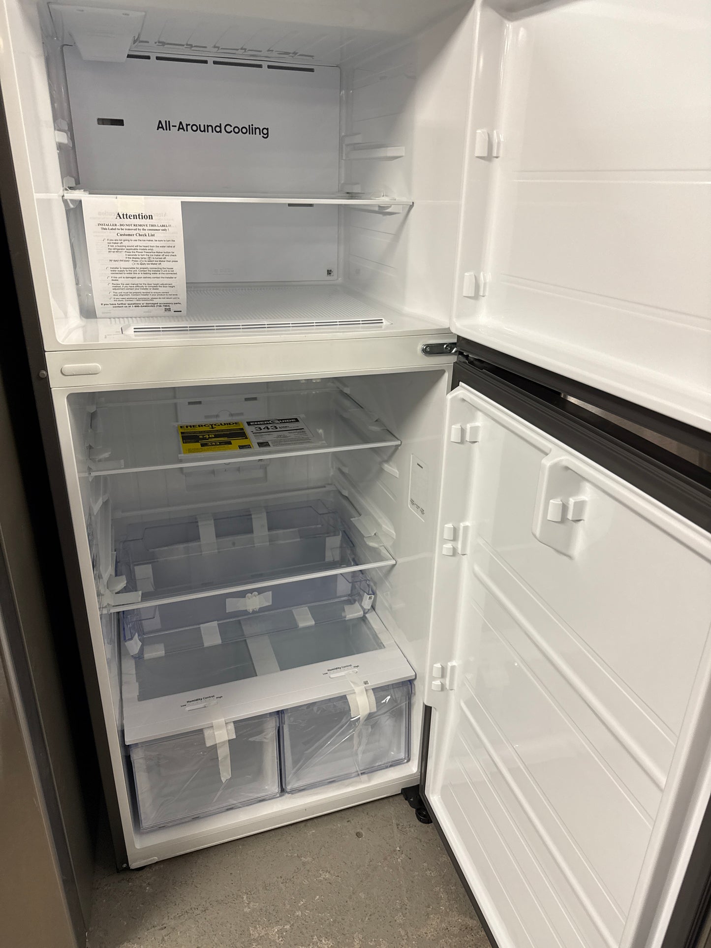 Réfrigérateur à congélateur supérieur 30 po de Samsung avec mode AI Energy (RT18DG6500SRAC) - Inox