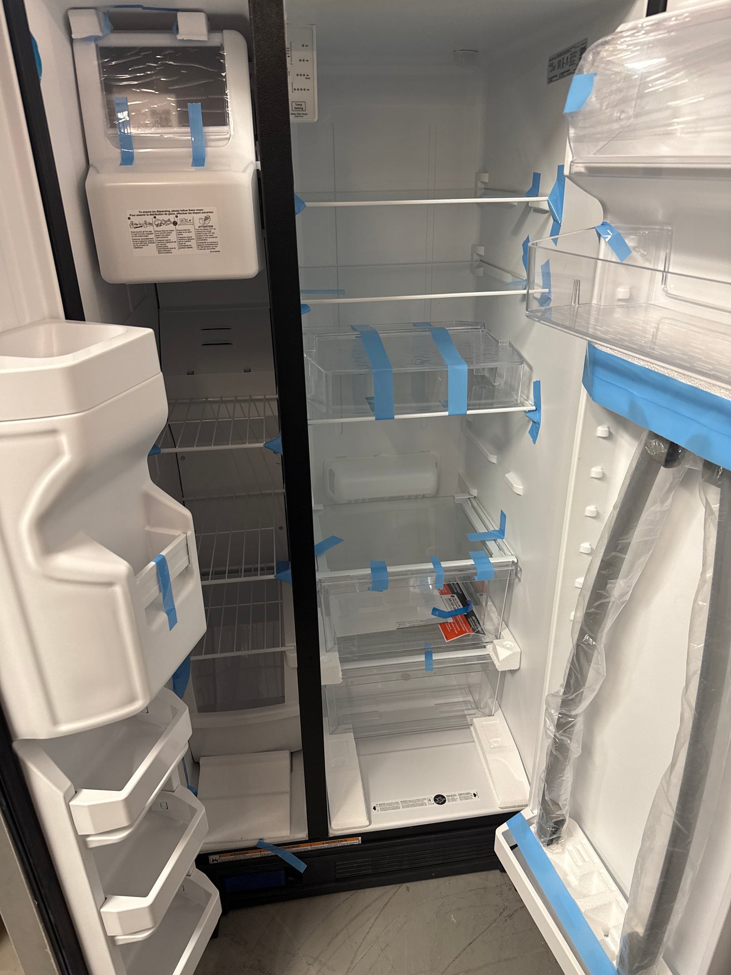 Réfrigérateur à congélateur juxtaposé 21,4 pi³ 33 po d'Amana (ASI2175GRS) - Noir sur inox