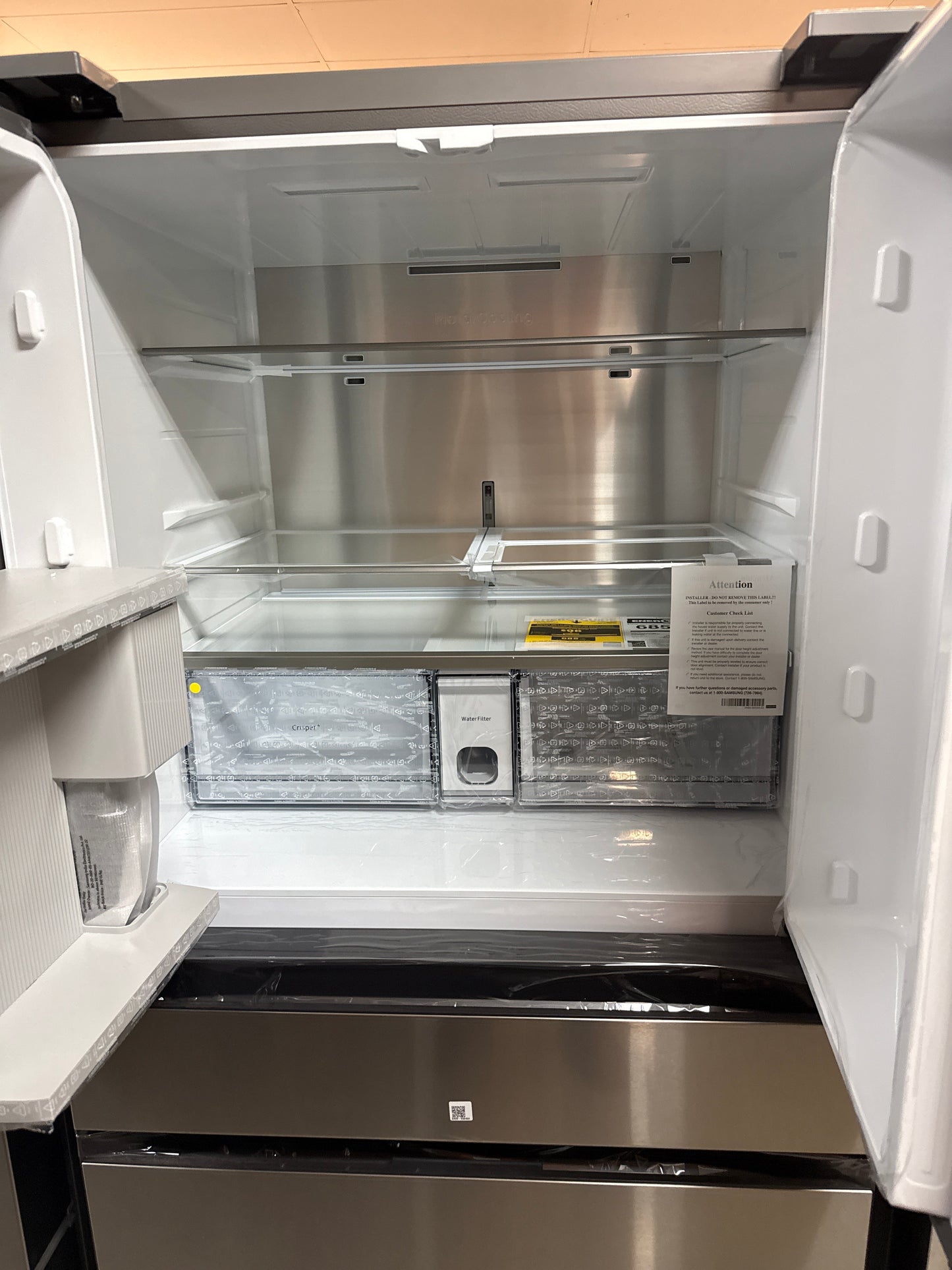 Réfrigérateur à 4 portes 28,8 pi³ 36 po avec distributeur d'eau de Samsung (RF29BB8600QLAA) - Acier inoxydable