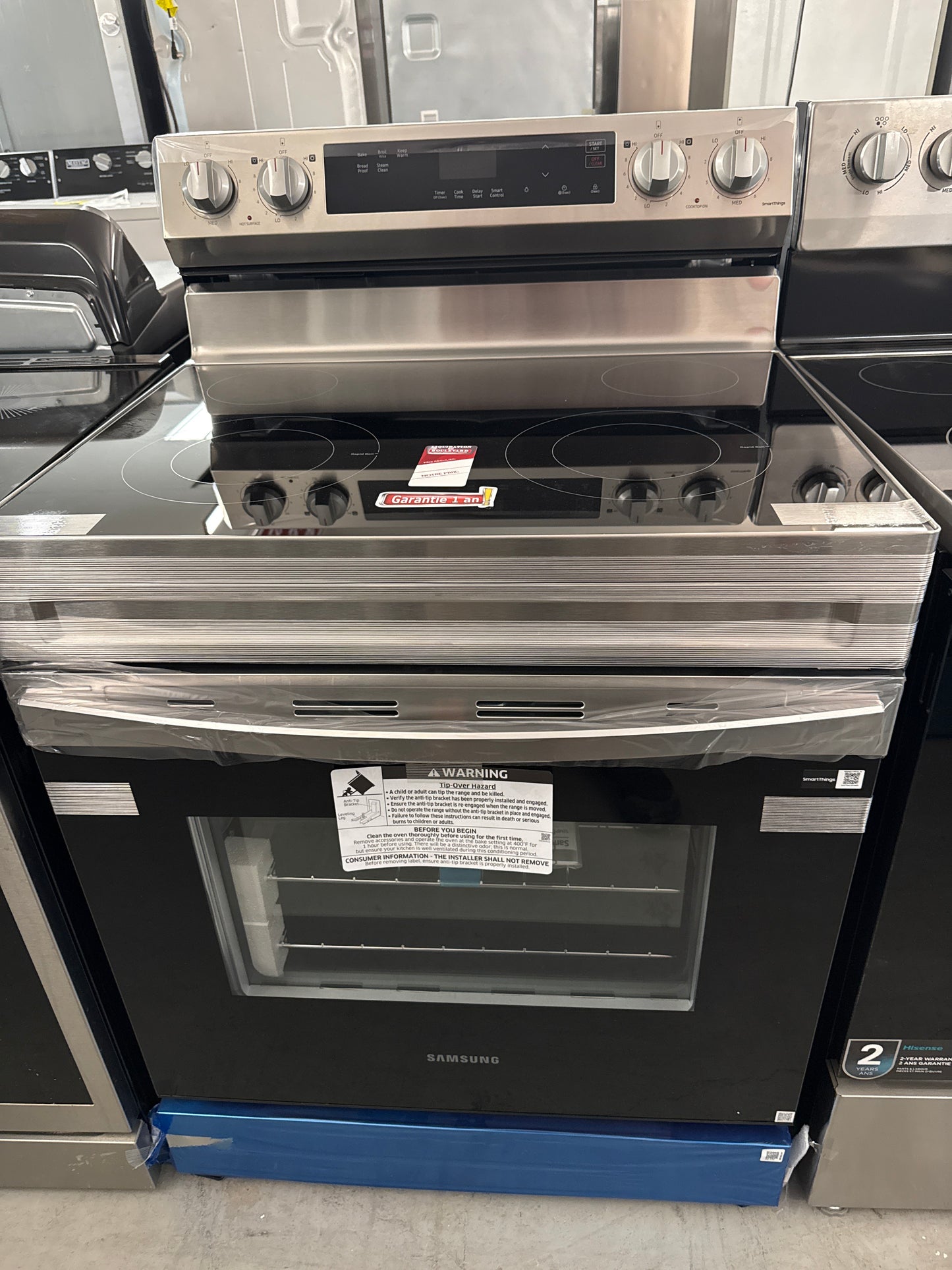 Cuisinière électrique autonome 6,3 pi³ 30 po de Samsung (NE63A6111SS) - Acier inoxydable