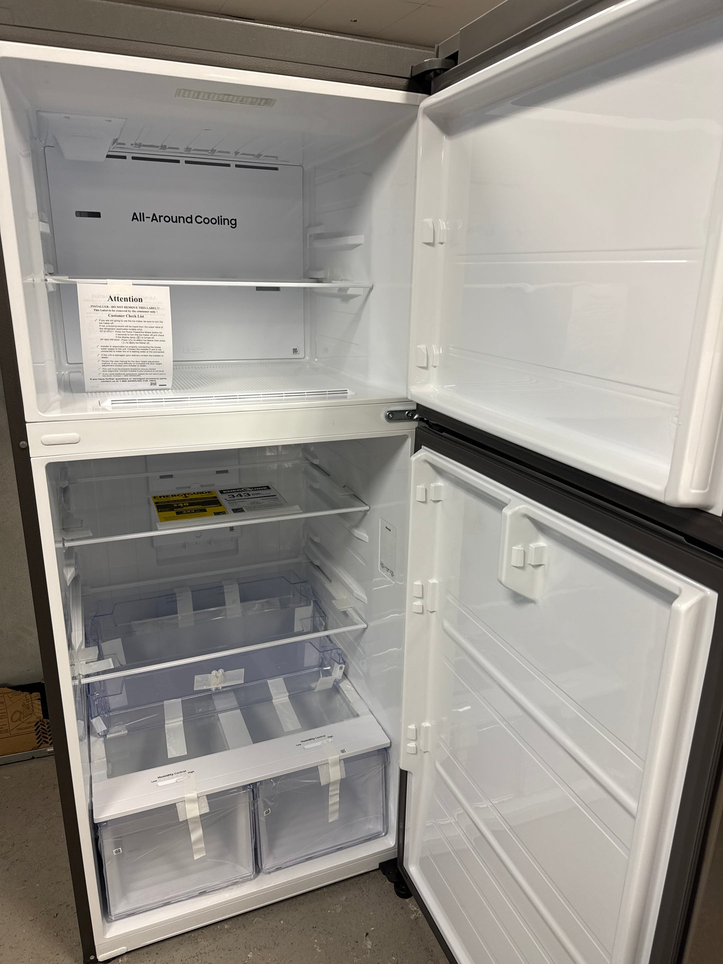 Réfrigérateur à congélateur supérieur 30 po de Samsung avec mode AI Energy (RT18DG6500SRAC) - Inox