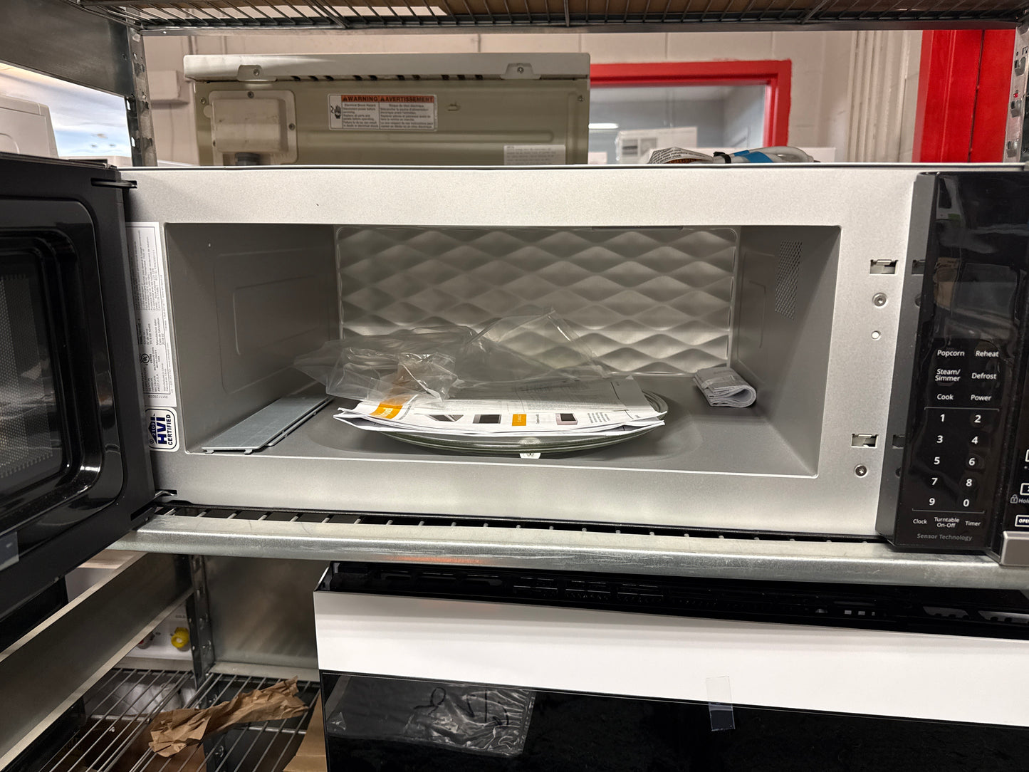 Four à micro-ondes À hotte intégrée de 30 po, 1,1 pi cu YWML75011HZ