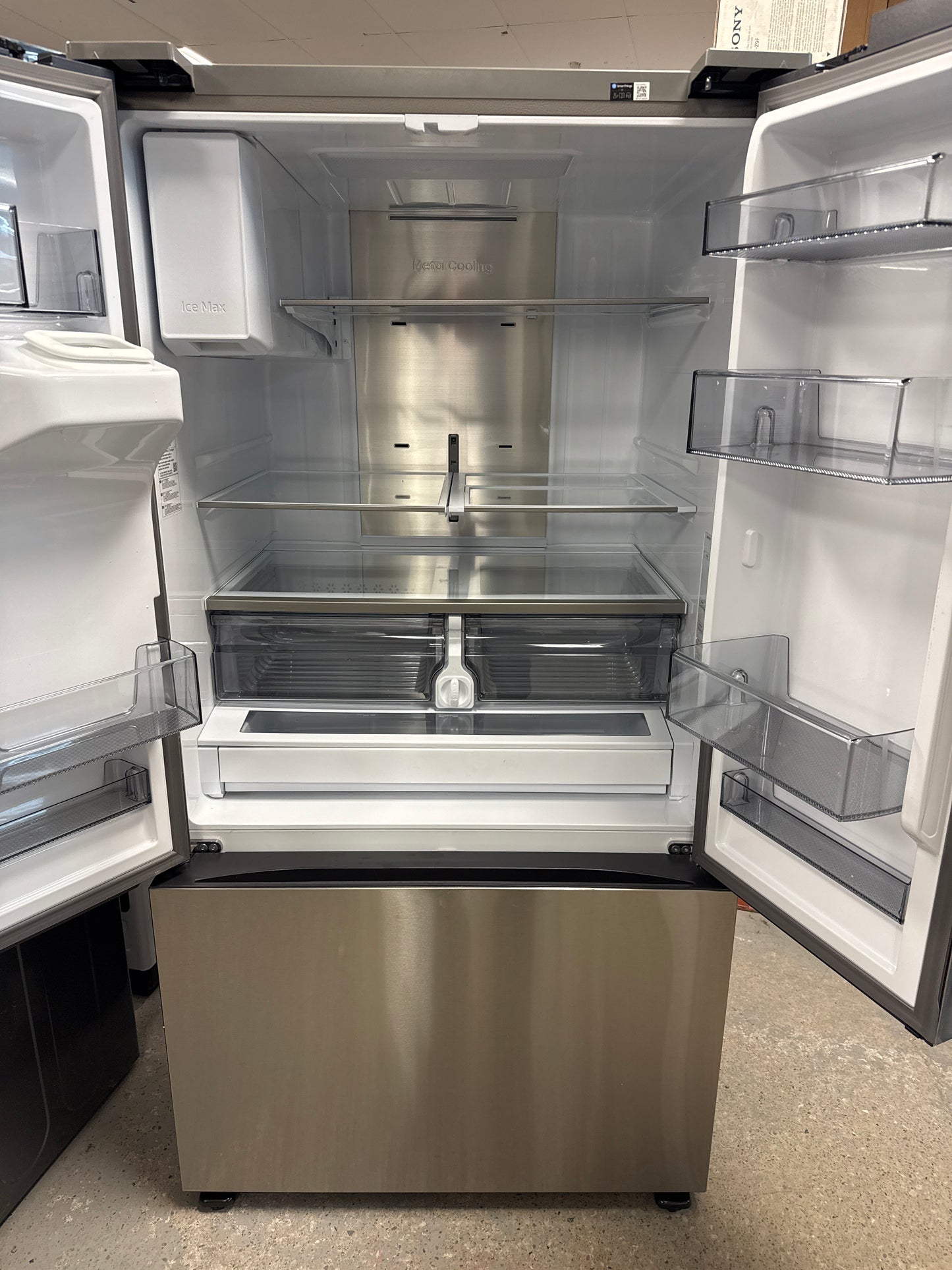 Réfrigérateur à deux portes de 30,5 pi³ et 36 po avec distributeur d'eau et de glaçons de Samsung (RF32CG5400SRAA) - Inox